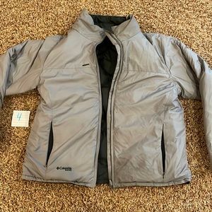 Columbia, grey and black reversible puffer jacket. Fits like a womens Medium.